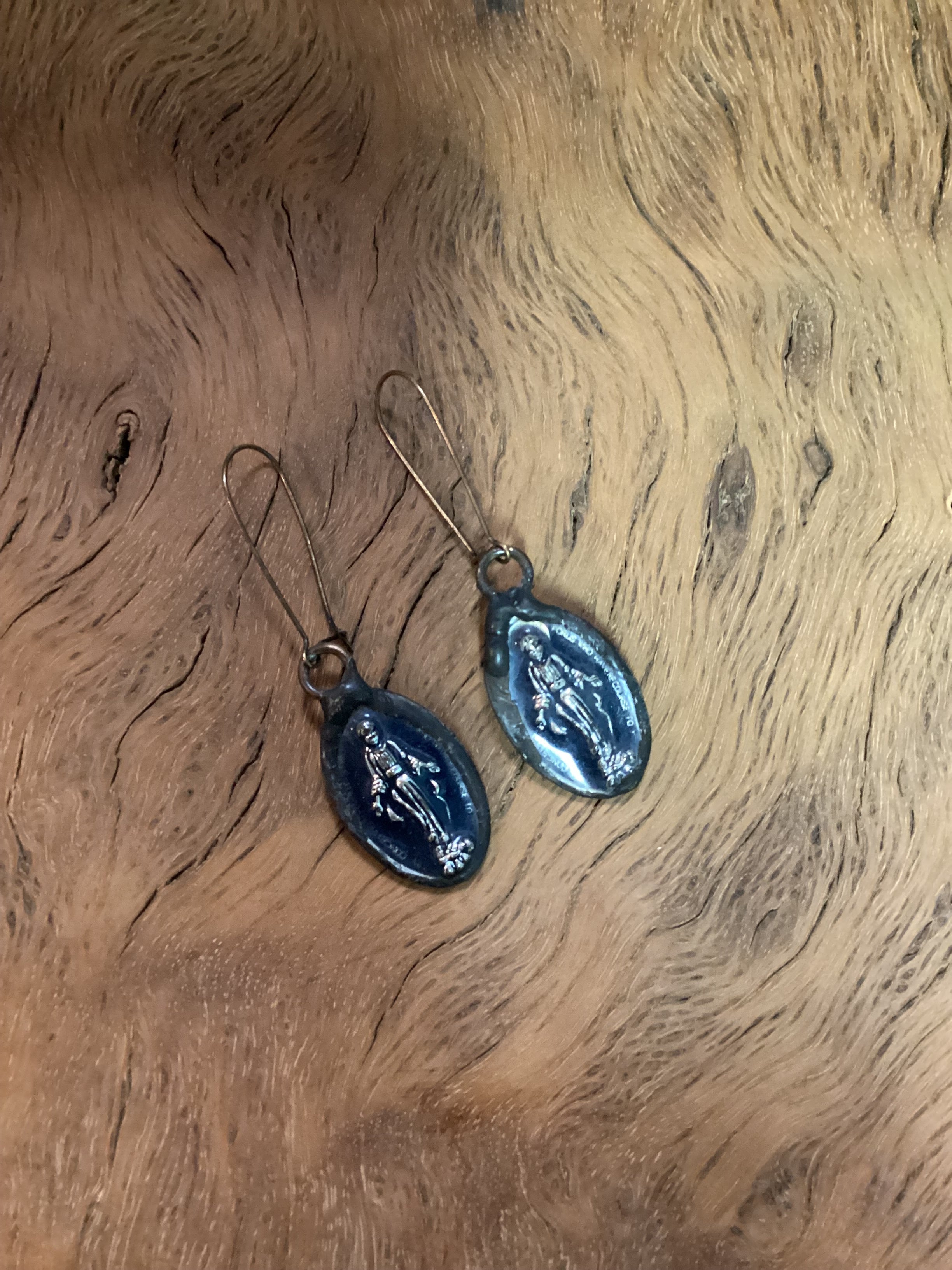 saint womens earrings