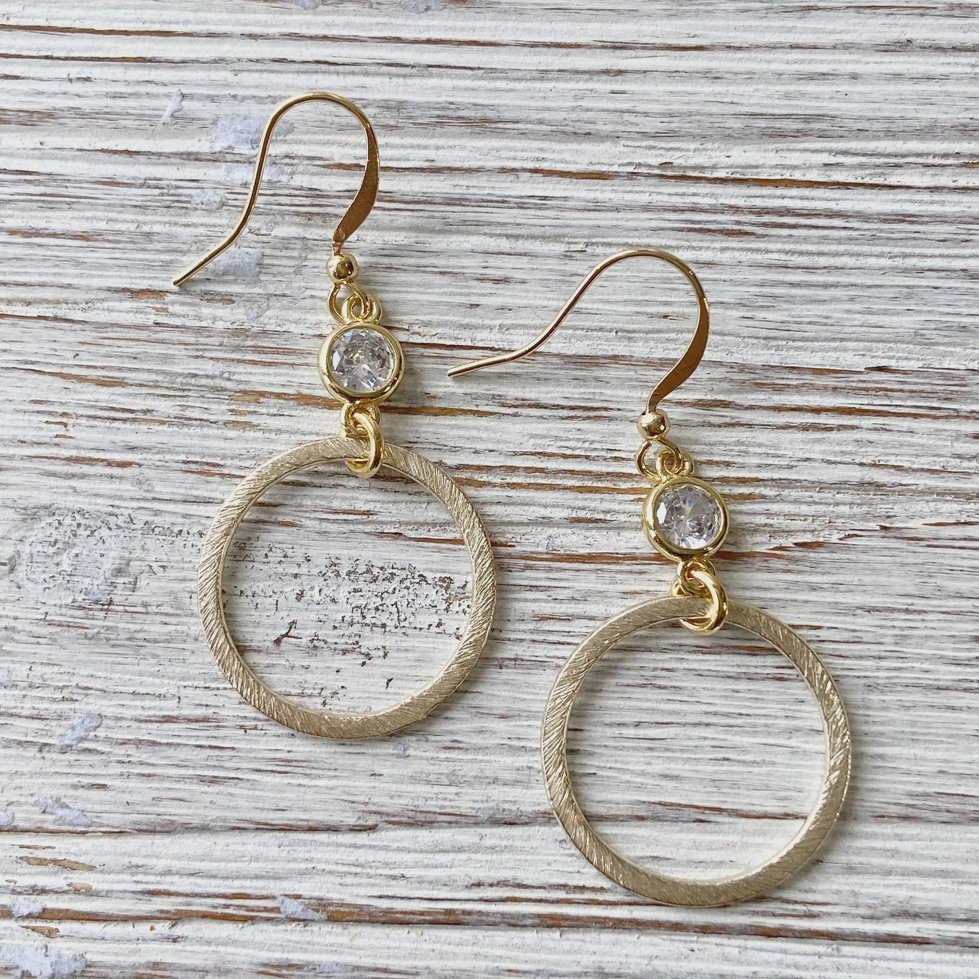 gold hoops with gem